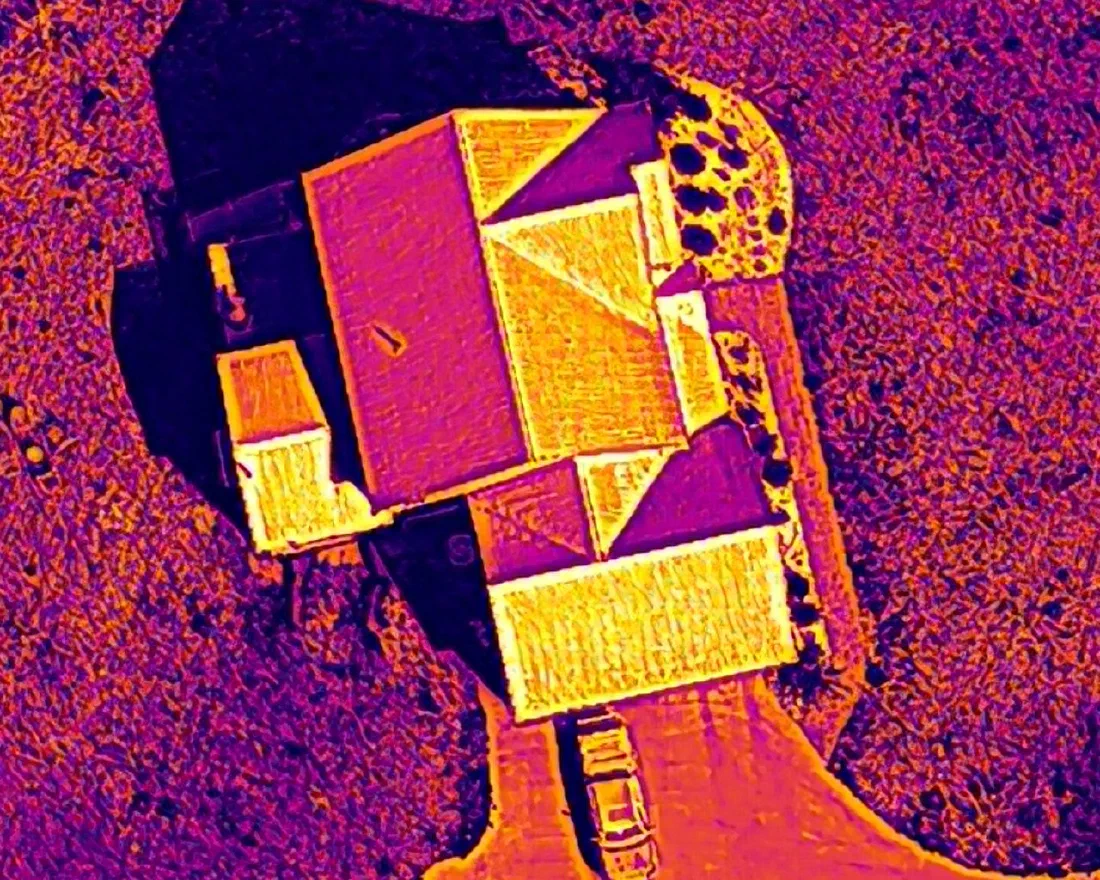 Radiometric thermal image of a roof, colored by surface temperature